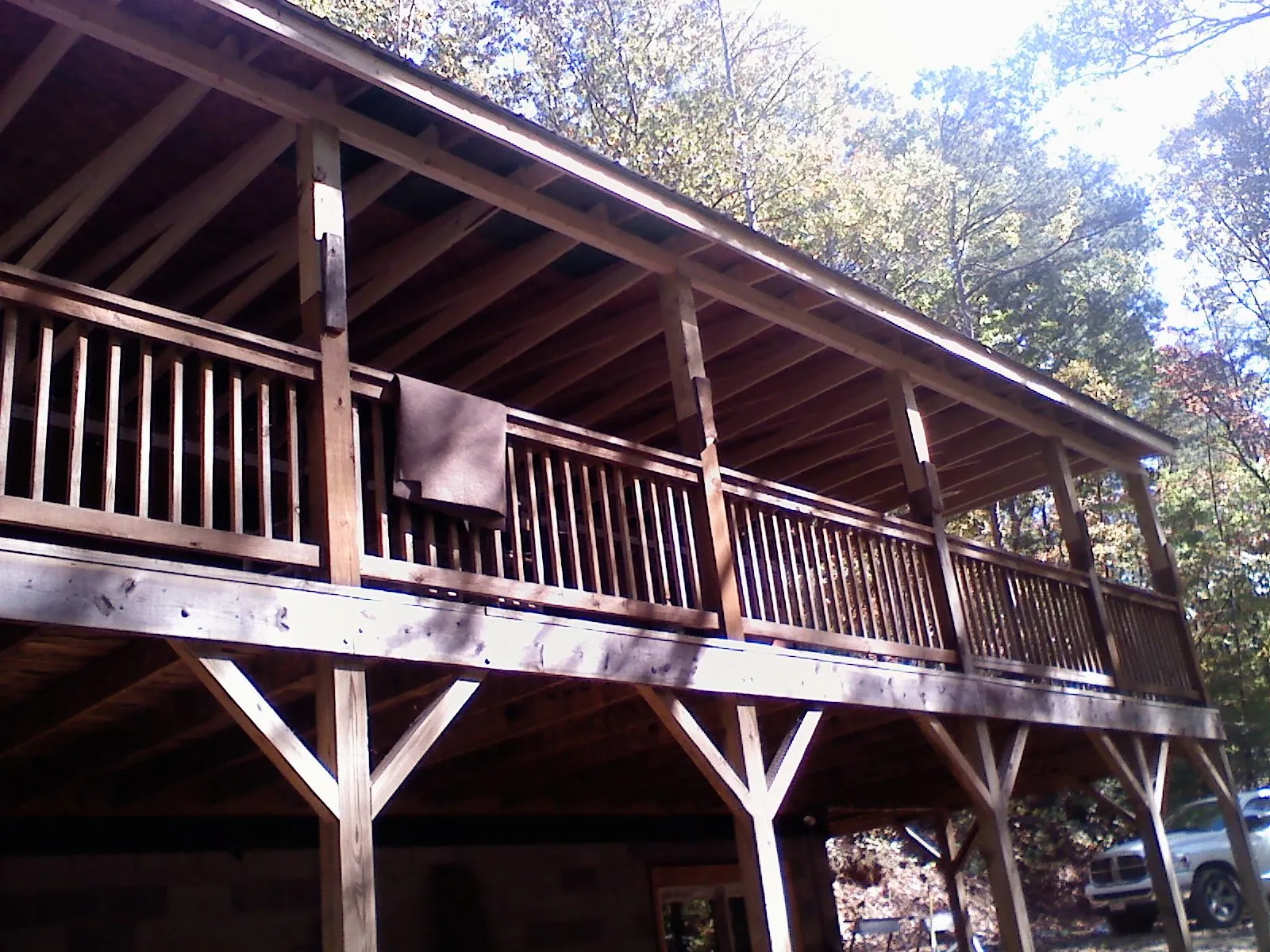 Timber framing under a new elevated porch and deck — Roof Leak Repair in Brasstown by Roofing Brothers